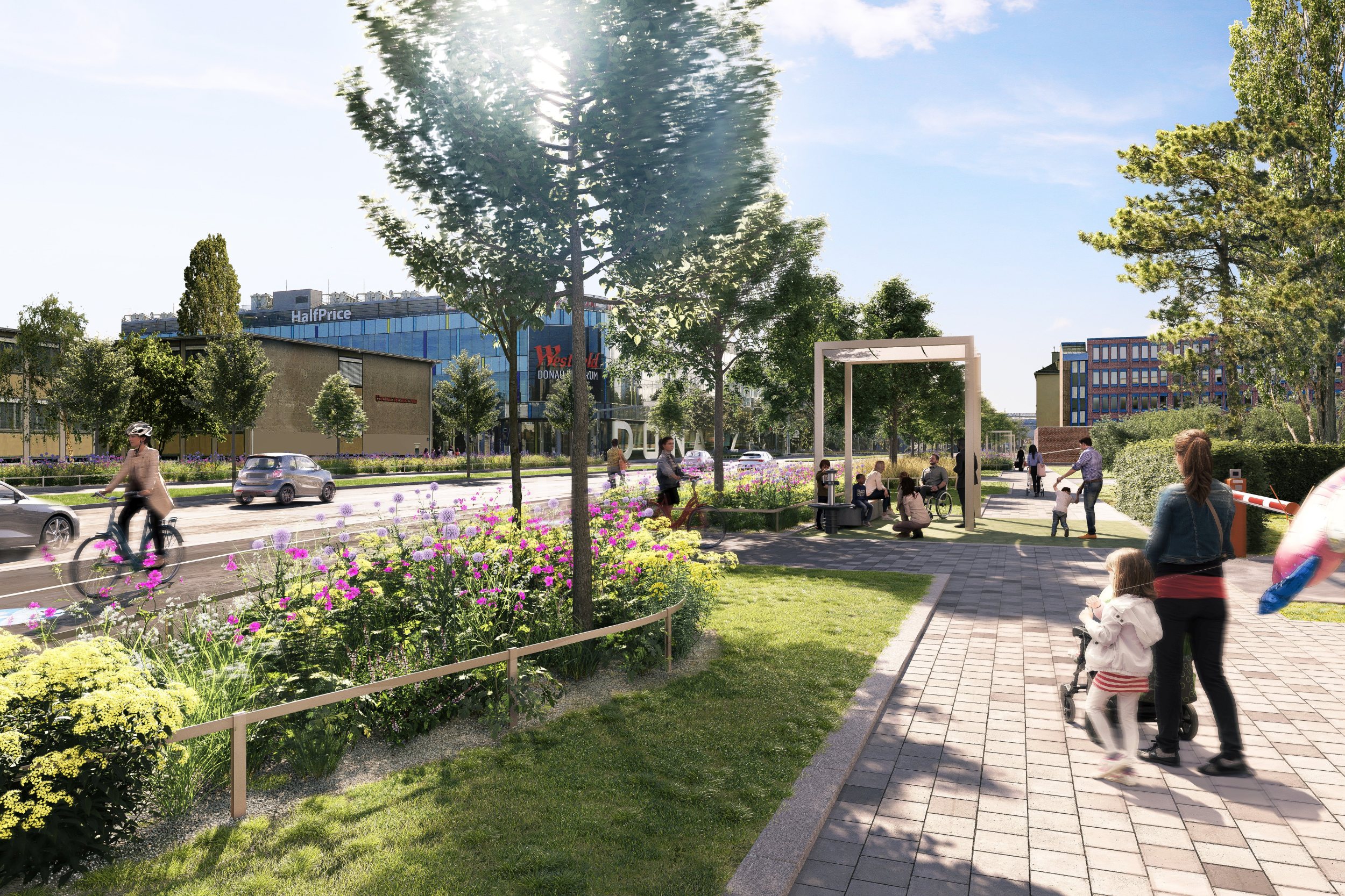 Begrünung auf der Wagramer Straße, dahinter der neue breite Radweg